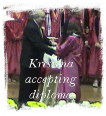 Kristina accepting diploma (14413 bytes)
