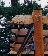 Hand carved rafter tail at Store entrance