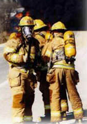 Honolulu Fire Fighters prepare to do battle.