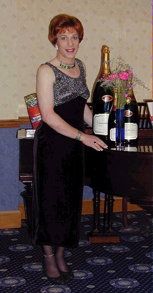 Black velvet dress with silver thread top. Slit at the back!