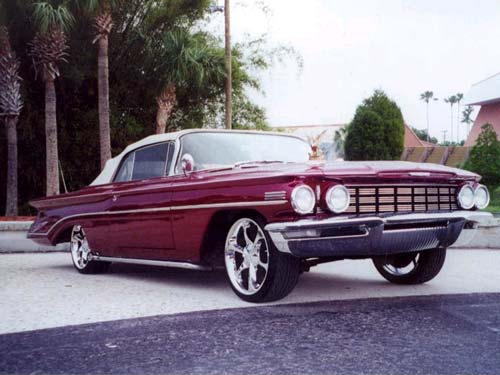 1960 Oldsmobile Dynamic 88 lowrider convertible with chrome rims