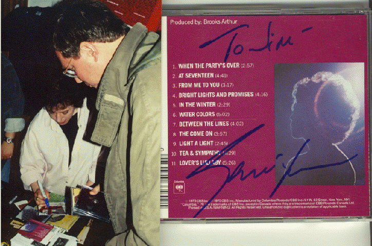Janis Ian signs newly released GOD AND THE FBI disc.