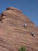 Rob and Noli climbing one of the Red Cliffs