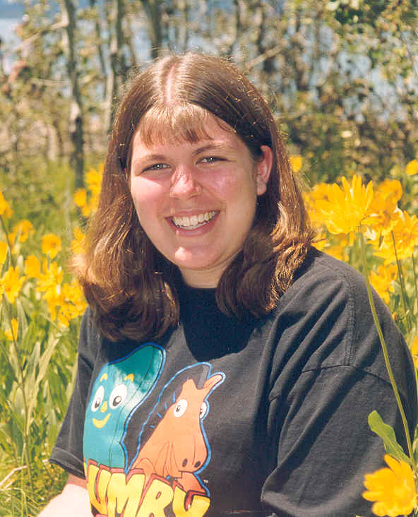 So we were in the Tetons, and I saw these flowers and made mom take my picture, not thinking about the shirt I had on...