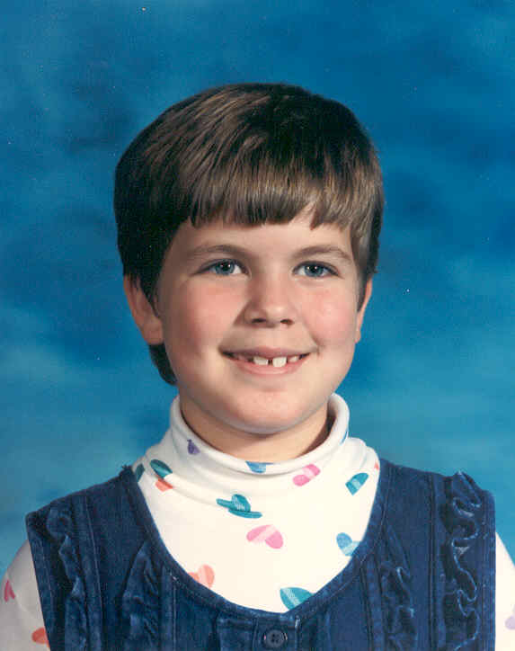 I remember walking to school in that jumper, you can see my nice teeth too...