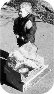 My son with my first solar oven