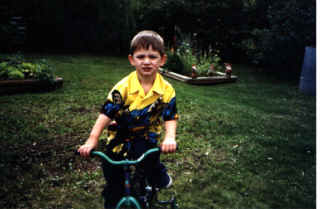 Riding around in Gramma Ford's Yard