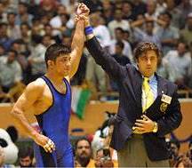 Al Reza Dabir, Medalla de Plata en los 66kg