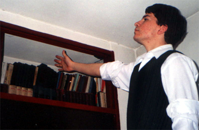 Showing off some of his amazing books...