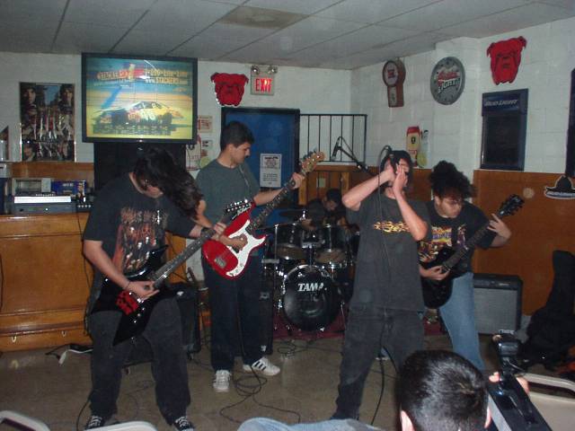 DYING EMBRACE WITH THEIR NEW BASS PLAYER.