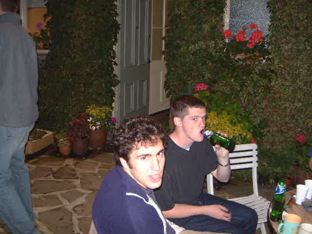 Dan deepthroating a bottle in the corner