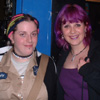 A shy girl with nice dreads outside a gig