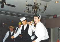 Groomsmen dancing to YMCA