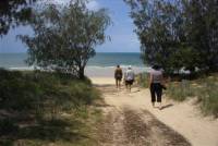 Grace, Bill and Marghe walk to the beach