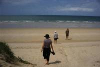 Grace, Bill and Marghe walk to the beach