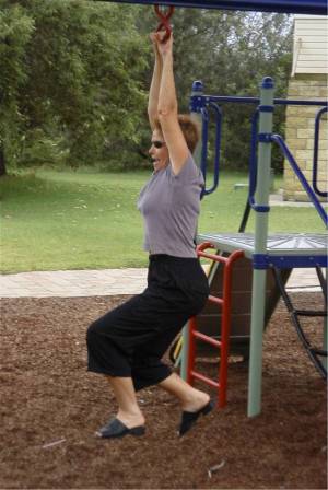 Marghe braves the monkey bars yet again