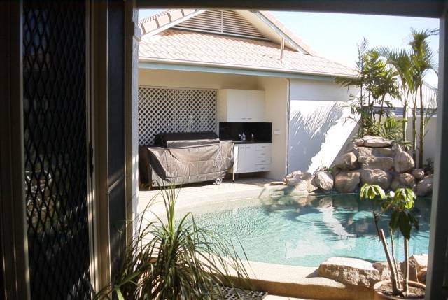 Marty's BBQ area with running water and cupboards.