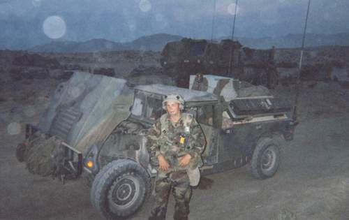 SPC Travis Rowly (my gunner) and our infamous steed
