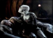 Chiana helps a wounded D'Argo
