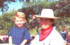 Smiling cowboy on pony (73506 bytes)