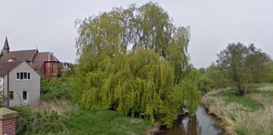 View of the Parish Church from the River Roden Foot Bridge