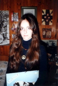 Carrying one of my Pink Floyd LPs, Atom Heart Mother. I look like an alien or something.
