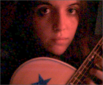 That's me holding Raybach, the guitar my boyfriend gave me for my birthday.