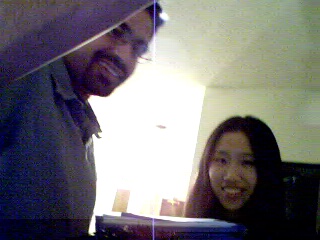 Samit is teaching me stupid Economics during the party