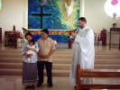 Fr. Dan blessing Ama, Ina and Me!