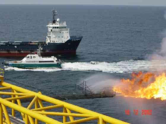 Flaring Gas Tests with the Surfer Crew-Change boat and supply boat 'De Vries Tide' in background