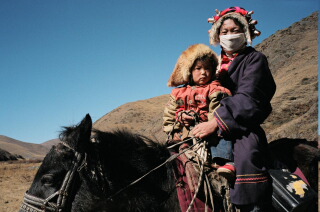 Mom on horseback in Tagong
