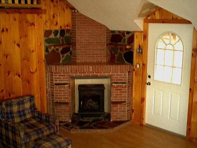 Faux fireplace skirting the wood stove