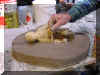 Use a small rounded wooden inplement to put small holes around the sculpture. jamdot1.jpg (140332 bytes)