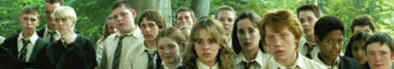 Draco Malfoy (Tom Felton) in the background with the rest of the Care of Magical Creatures Class in the third Harry Potter Movie, "Prisoner of Azkaban". Also, pictured in front, Emma Watson and Rupert Grint. 