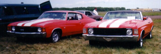 Both cars, front view.