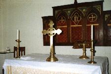 The Communion table is set for the service.
