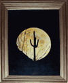 The rising moon on the desert