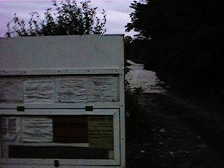 The building permit board by the road