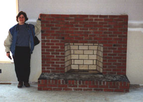 Mary Ann by the fireplace