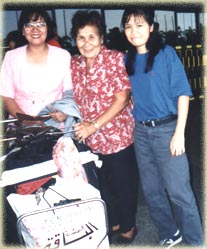 Nellie with Mom & Bhing at the airport