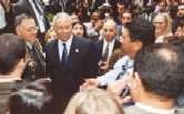 I'm chasing Colin Powell to get a picture with him.