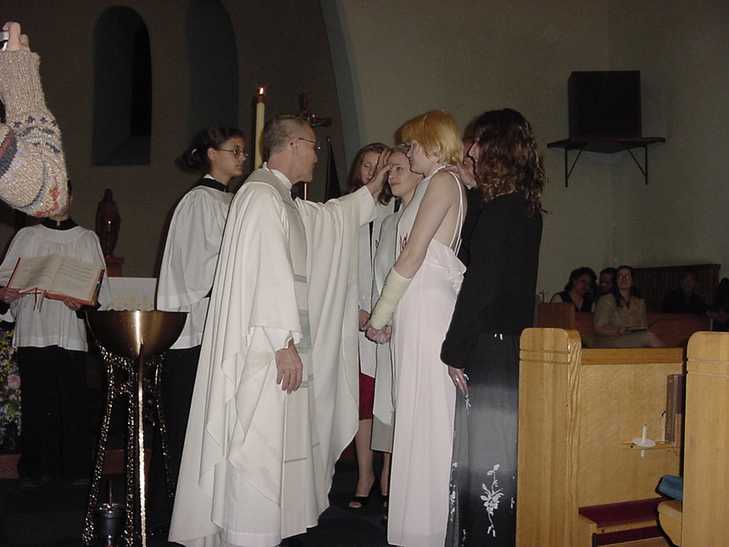 Part of the ceremony includes an annointing with oil.