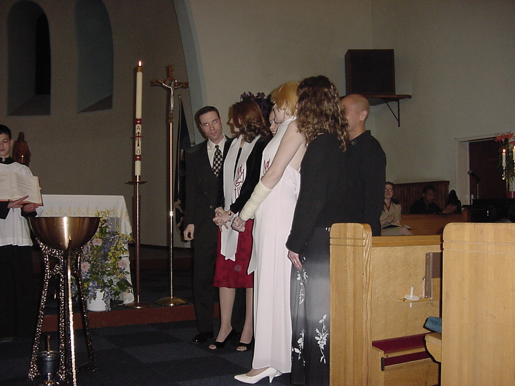 We stood infront of the church as the priest told what we had done the previous months in preparation.