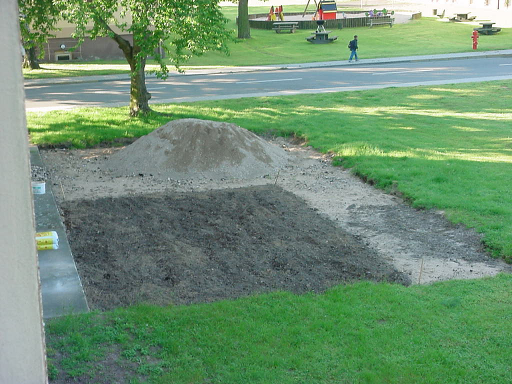 Bob spends his evenings playing Farmer Bob. The dark area is going to be the actual garden the rest will be filled with grass. 