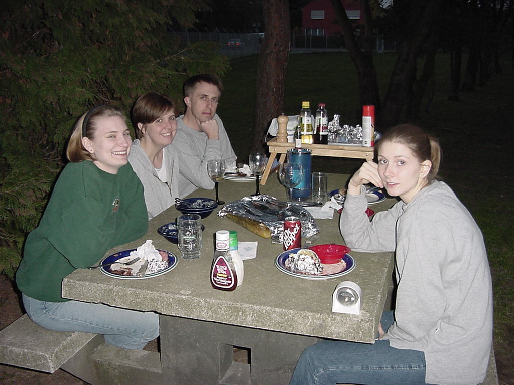 Here is a picture of our neighbors Stephanie and Kirby and our friend Ariel. On a warm evening we all love to grill out!!