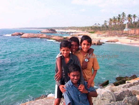  Local children posing in front of my Camera, seen in a festive mood on the eve of Christmas, before everything happened.