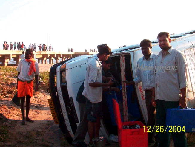  The vehicle driver and some of my colleagues, escaped with minor injuries, after washed away by the wave.