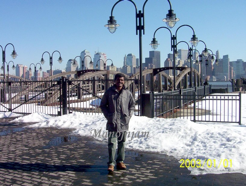  While waiting for a ferry to reach the Statue of Liberty.