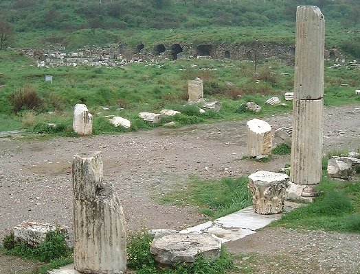  Two columns, aqueduct in background 