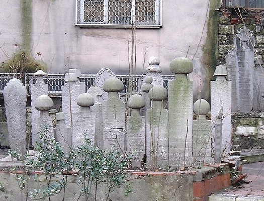 Tombstones visible from the street, by the tramline near Topkapi Palace
